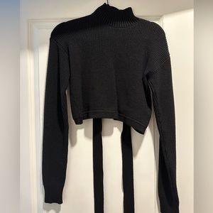 Black cropped sweater with knitted back detailing